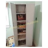 Metal cabinet with contents