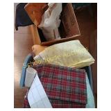 Basket of fabric & box of braces