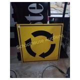 Wood round a bout sign