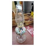 Glass lamp with marbles