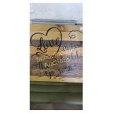 Hangable wood sign. Approx 24 in tall and 24