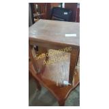 Small table. Approx 12 inches wide and 10 inches