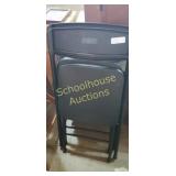 Pair of black folding chairs