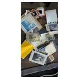 Assorted old pictures and slide films.