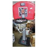 Kids plastic basketball stand. Approx 5 ft tall.