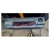VHS player. Has all its cords but is sold AS IS