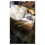 Large box of blankets and throw pillows