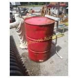Red metal barrel. Great for burning