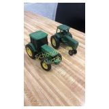 Pair of greens. John Deere 7410 is plastic. On
