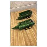 2 John Deere wagons. Dump trailer is marked