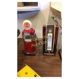 2 mini gas pumps. Red is alarm clock Marksman