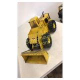 Tonka yellow mighty loader tires marked XMB-975