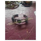 Small turquoise and silver. Cant tell if there is