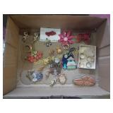 Group of brooches, pins, and rings. One ring