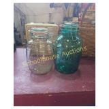 Pair of glass cookie jars with flip top with