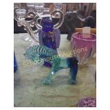 Blue glass paperweight and blue donkey broken ear