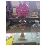 Beautiful pink oil lamp with round shade