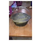 Cast iron Dutch oven. Bottom marked Made in