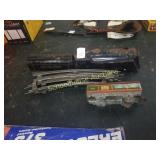 Small metal engine ,coal car, car, and track.