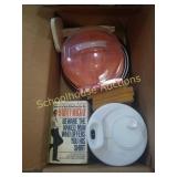 Group with plates ,kitchen goodies and books