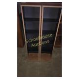 Two little movie/media stands. 
Each one stands