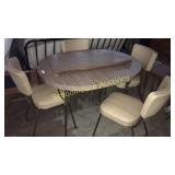 Vintage kitchen table with 4 chairs. The table
