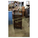 Small free standing jewelry box with 5 drawers.