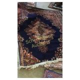 Red and blue rug. Approximately 6