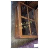 Low standing wood and glass top coffee table