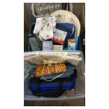 Two totes of lightbulbs, heating pad, pot holders