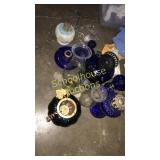 Blue glass and other lanterns and candle holders