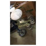 3 lanterns a candle holder and a box of candles