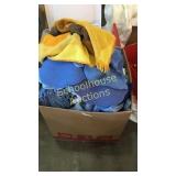 Large box of cloths and towels and other fabric