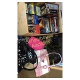 Medium box of DVDs and vhs and pile o purses