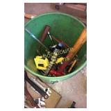 Green bucket of tools