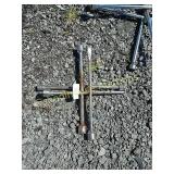 2 slightly smaller wrenches