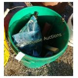 Green bucket with contents