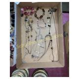 Tray of fashion jewelry necklaces and bracelets