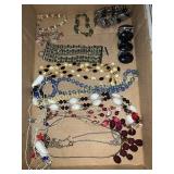 Tray of fashion jewelry necklaces and bracelets