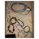 Tray of fashion jewelry necklaces and bracelets