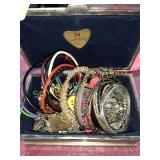 Silver color jewelry box loaded with fashion