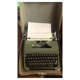 Olympia De Luxe typewriter in case