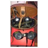 2 binoculars. Bushnell insta focus 7x35, Bausch &