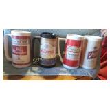 Set of 4 plastic assorted beer steins