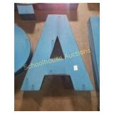 Blue Metal letter A sign.  About 24 inches