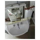 Sink & mirror approx 24' wide