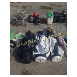 3 golf bags and clubs