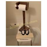 Shower chair toilet paper roller and shower slip