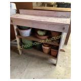 Potters bench with pots clay and more