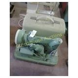 Green singer sewing machine with case. Cat. no.